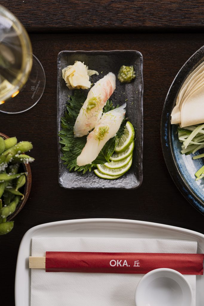 Fresh sushi platters and Robata grill dishes at OKA, a japanese restaurant near me offering sushi near me across Soho, Marylebone, and Notting Hill in London.